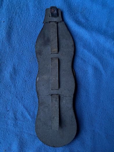 Vintage horse brasses on leather strap