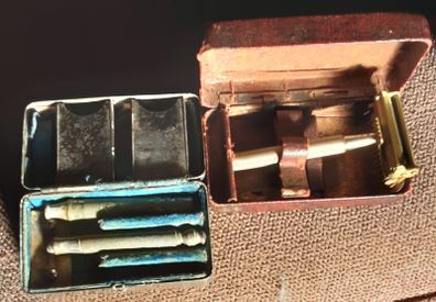 two boxed vintage razor's