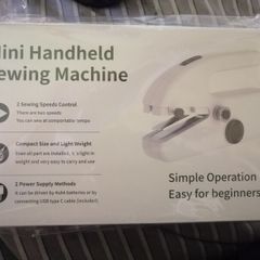 Handheld sewing machine