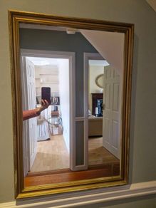 large glass gold mirror