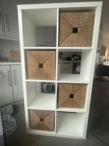White Ikea Kallax with 4 Wicker Boxes