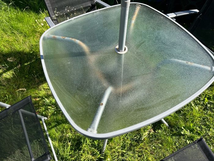 Outdoor table and folding chairs