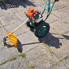 Rufcut grass trimmer on wheels.