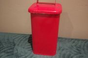 Helen James considered  red tin with lid