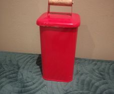 Helen James considered  red tin with lid