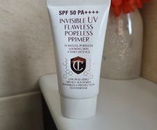 Charlotte Tilbury Invisible UV Flawless Poreless Primer 60ml  HALF LEFT