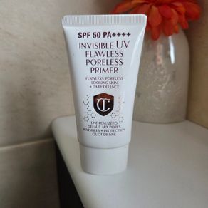 Charlotte Tilbury Invisible UV Flawless Poreless Primer 60ml  HALF LEFT
