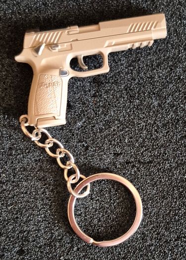 Keyring, firearms, baretta, luger, mauser,sig sauer, colt.