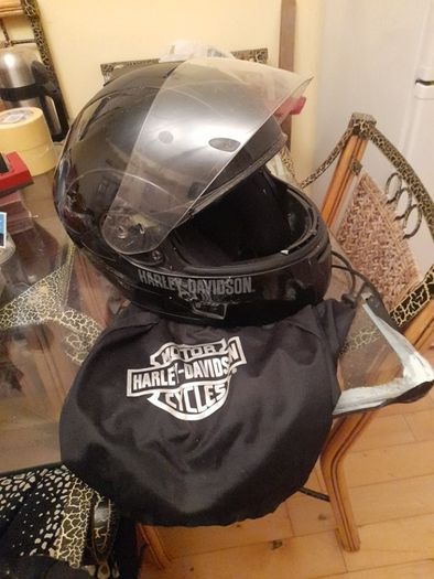Selection of quality motorbike jackets,  trousers,  helmets  , and boots ..