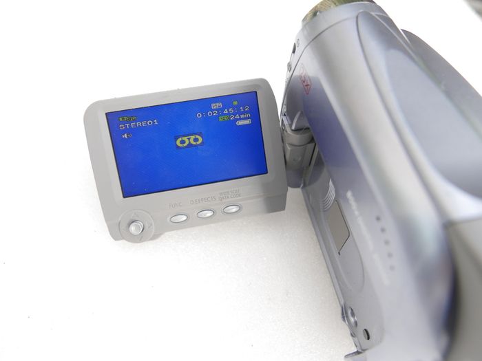 Canon MV900 MiniDV Camcorder with charger, works well.