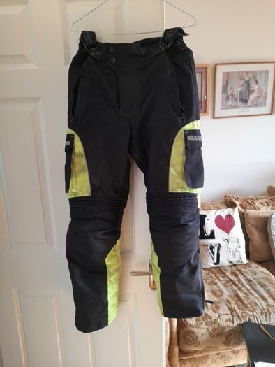 Selection of quality motorbike jackets,  trousers,  helmets  , and boots ..