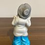 Vintage Bisque Figurine Of a Boy in Oversized Clothes Image 3