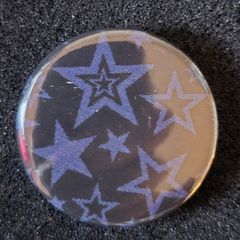 Star, pin back button badge.