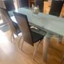Glass & Chrome Dining Room Table with 6 Black leather and Chrome Chairs Image 5