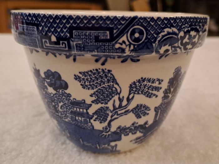 Antique blue and white willow pattern