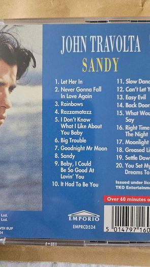 John Travolta. Sandy .