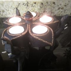 Hand carved wooden elephant candle holder