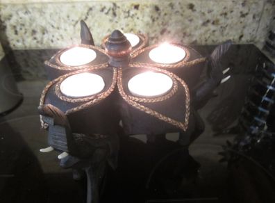 Hand carved wooden elephant candle holder