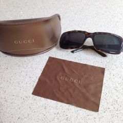 Genuine Gucci glass and case