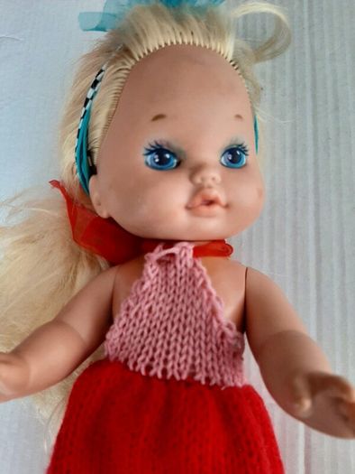 collectable vintage matel doll in original clothes
