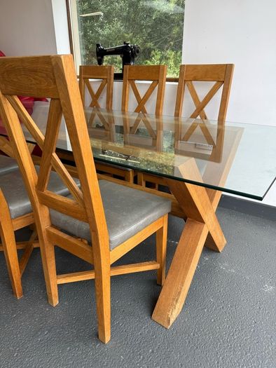 Glass dining room table with 6 chairs