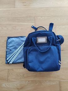 Baby changing bag with fold out bed