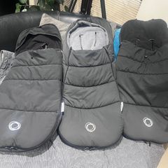 Bugaboo black foot muffs in swords