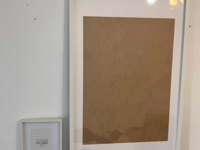 Two white picture frames