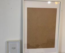 Two white picture frames