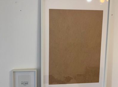 Two white picture frames