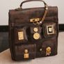 Vintage inspired dark brown backpack with antique gold details Image 2