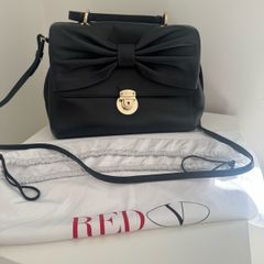 RED V Valentino genuine black leather crossbody bag with large bow and pink interior lining