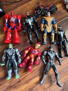 Great bundle of Marvel superhero toys including Spider-Man, Venom, Thanos, Hulk, Iron Man and Captain America, plus Spider-Man motorbike.  Various large and smaller action figures included as pictured