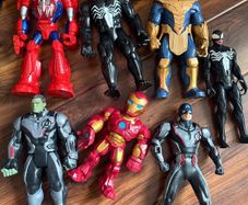 Great bundle of Marvel superhero toys including Spider-Man, Venom, Thanos, Hulk, Iron Man and Captain America, plus Spider-Man motorbike.  Various large and smaller action figures included as pictured