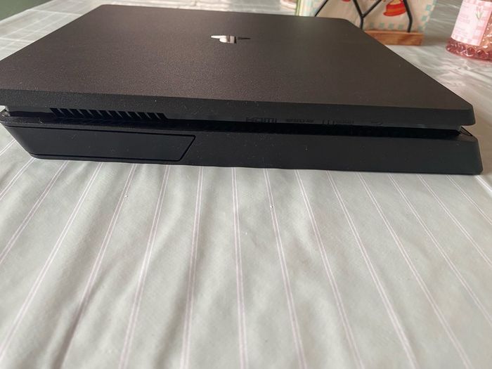 PlayStation 4 PS4 Console with controllers