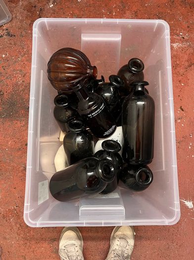 Approx. 40 Clear, Black, Brown, Amber & Gold Vases
