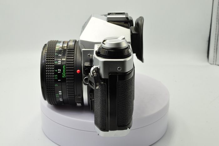Canon AE-1 Program Silver/ Chrome 35mm SLR Film Camera with fast Canon FD 50mm f1. 8 FDn, Recently FULLY SERVICED and in Good Condition.