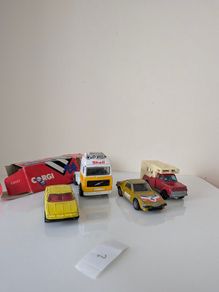 4 vintage Corgi Juniors die-cast models, made in Great Britain. These are classic 1:64 scale models