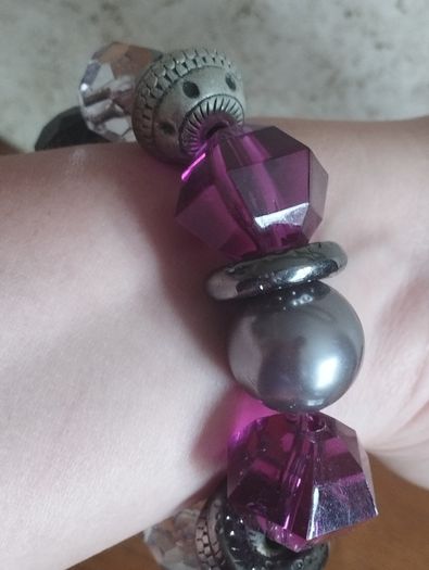 Vintage bracelet with purple beads.