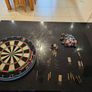 Dartboard + 7 sets of darts + spares - job lot Image 2