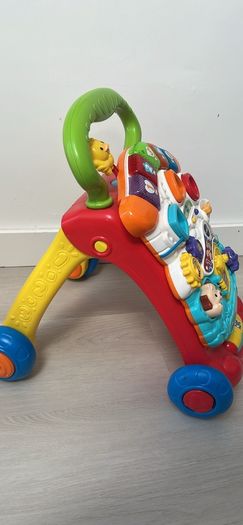Adjustable baby safety gate and Vtech walker