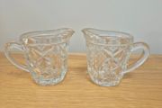 Two vintage glass jugs