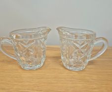 Two vintage glass jugs