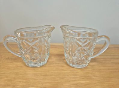 Two vintage glass jugs