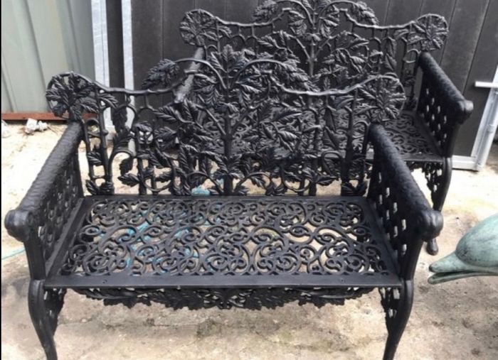 Pair cast iron black ram benchs
