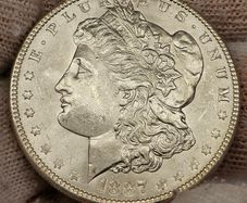 USA United States Silver 1887 Morgan Dollar Beautiful Uncirculated Lustrous Superb!