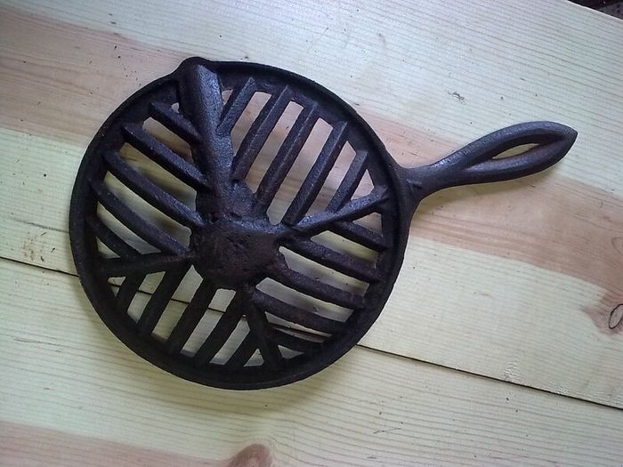 Old steaming iron. Irish farm bygone