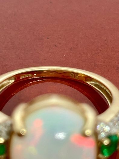 Gold Rind with Opal, Emerald and Moissanite