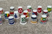 A Collection of Vintage Thimbles with Company Logos
