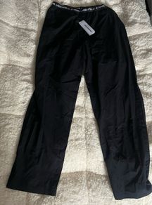 Karl Lagerfeld pajama nightwear and lightweight trousers. Perfect for relaxing in style. black size large brand new with tag